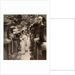 A woman Shinto devotee counting the stone lanterns, Kasuga Shrine, Nara, Japan by Underwood & Underwood