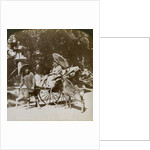 Girl feeding sacred deer on her way to prayers, grounds of Kasuga Temple, Nara, Japan by Underwood & Underwood