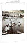Women crossing the lake on stepping stones, Suizen-ji Garden, Kumamoto, Japan by Underwood & Underwood