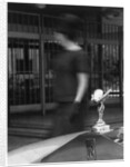 Woman walking past a Rolls-Royce by Anonymous