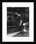 Woman walking past a Rolls-Royce by Anonymous