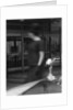Woman walking past a Rolls-Royce by Anonymous