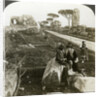 Tombs and children in traditional dress, Appian Way, Rome, Italy by Underwood & Underwood