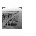 Machine gun section and infantry crossing a pontoon bridge, World War I by Realistic Travels Publishers