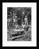 Indians of the Putumayo River with a decapitated head, Amazonia by Anonymous
