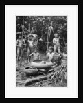 Indians of the Putumayo River with a decapitated head, Amazonia by Anonymous
