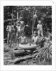 Indians of the Putumayo River with a decapitated head, Amazonia by Anonymous