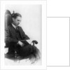 Man sitting in a chair reading a book by Anonymous