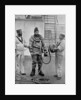 A diver from the battleship HMS Camperdown in his diver's dress by Gregory & Co