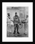 A diver from the battleship HMS Camperdown in his diver's dress by Gregory & Co