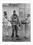A diver from the battleship HMS Camperdown in his diver's dress by Gregory & Co