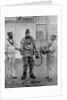 A diver from the battleship HMS Camperdown in his diver's dress by Gregory & Co