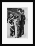 A suffragette confronting two policemen by Sport & General