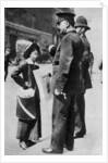 A suffragette confronting two policemen by Sport & General