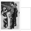 A suffragette confronting two policemen by Sport & General