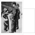 A suffragette confronting two policemen by Sport & General