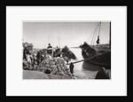 Unloading cargo from a boat, Muhaila, Baghdad, Iraq by A Kerim