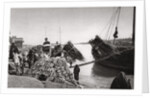 Unloading cargo from a boat, Muhaila, Baghdad, Iraq by A Kerim