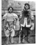 Eskimo hunter and his wife in winter costume by Brown Bros