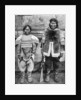 Eskimo hunter and his wife in winter costume by Brown Bros