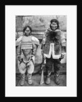 Eskimo hunter and his wife in winter costume by Brown Bros