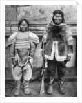 Eskimo hunter and his wife in winter costume by Brown Bros