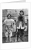 Eskimo hunter and his wife in winter costume by Brown Bros