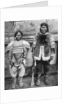 Eskimo hunter and his wife in winter costume by Brown Bros