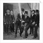 Eton's amateur firemen practising a hose drill, Berkshire by Anonymous