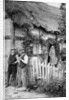 Two men chatting outside a cottage, near Lucton, Herefordshire by AW Cutler