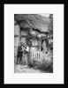 Two men chatting outside a cottage, near Lucton, Herefordshire by AW Cutler