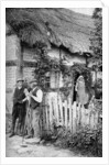 Two men chatting outside a cottage, near Lucton, Herefordshire by AW Cutler