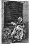 A woman at a spinning wheel, Dinan, Brittany, France by Anonymous