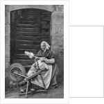 A woman at a spinning wheel, Dinan, Brittany, France by Anonymous