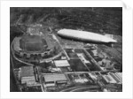 German airship 'Graf Zeppelin' flying over Wembley during the FA Cup Final, London by Central Press