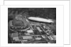 German airship 'Graf Zeppelin' flying over Wembley during the FA Cup Final, London by Central Press