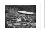 German airship 'Graf Zeppelin' flying over Wembley during the FA Cup Final, London by Central Press
