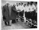 Winston Churchill greets the England football team, Wembley, London, October 1941 by London News Agency
