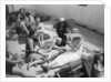 Passengers sunbathing on board a cruise ship by Anonymous