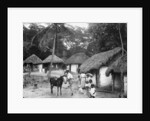 Family outside their home, Coolie Street, Kingston, Jamaica by Anonymous