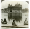 Fakirs at Amritsar, looking south across the Sacred Tank to the Golden Temple, India by Underwood & Underwood