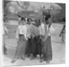 Woman and servants going to a market, Mandalay, Burma by Stereo Travel Co