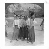 Woman and servants going to a market, Mandalay, Burma by Stereo Travel Co