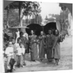 Buddhist monks with sunshades and fans, Rangoon, Burma by Stereo Travel Co