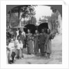 Buddhist monks with sunshades and fans, Rangoon, Burma by Stereo Travel Co