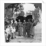 Buddhist monks with sunshades and fans, Rangoon, Burma by Stereo Travel Co