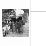 Buddhist monks with sunshades and fans, Rangoon, Burma by Stereo Travel Co