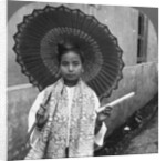Young Burmese woman holding a huge cigar, Rangoon, Burma by Stereo Travel Co