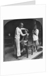A Chinese barber at Bhamo, Burma by Stereo Travel Co