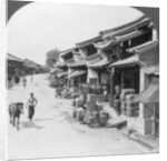Main business street of the Chinese quarter, Bhamo, Burma by Stereo Travel Co